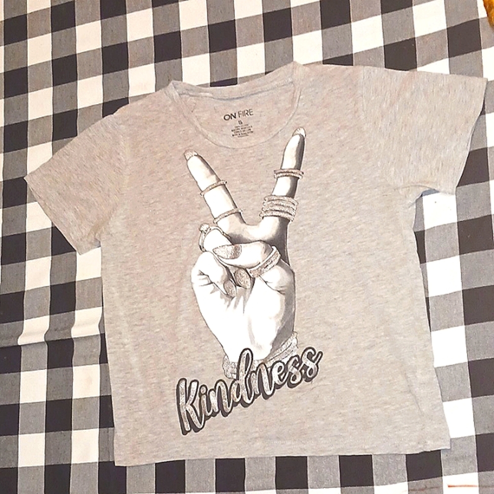 Mainly Grey with sliver glitter. A size small.
